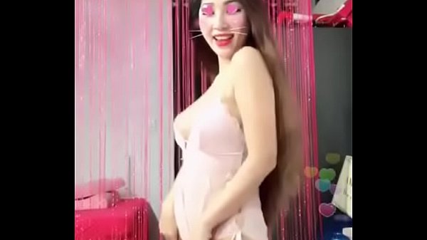 She danced with a gun on the Uplive show revealing her exposed skin