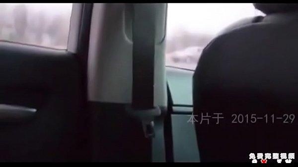 Young woman in car on the roadside