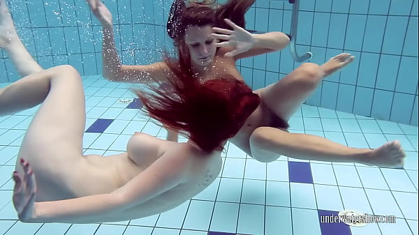 Two sensual babes Lucy and Katrin swimming naked