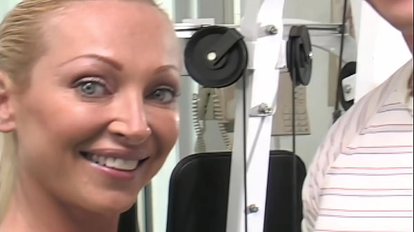 Huge boobed, brunette teen Linet Slag, is laying back on her couch, not wearing her bra or...