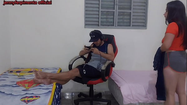 Step-sister_ changes next to her step-brother and he ends up fucking her on the gaming chair.