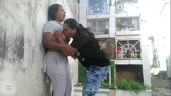 Without fear of anything, a couple of lesbians enjoy sucking each other's pussies and sucking each other's asses in the cemetery while people pass by