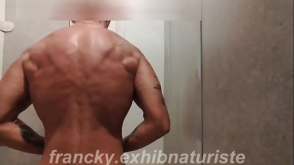 muscular guy shaves his balls and anus jerks off and cums in the gym shower